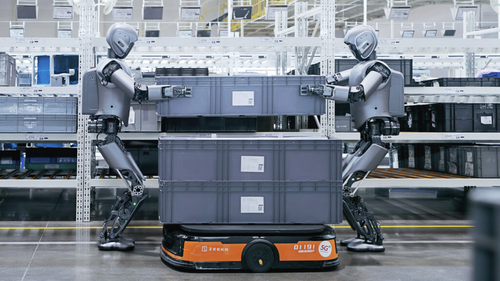 Humanoid robots collaborating in industrial manufacturing